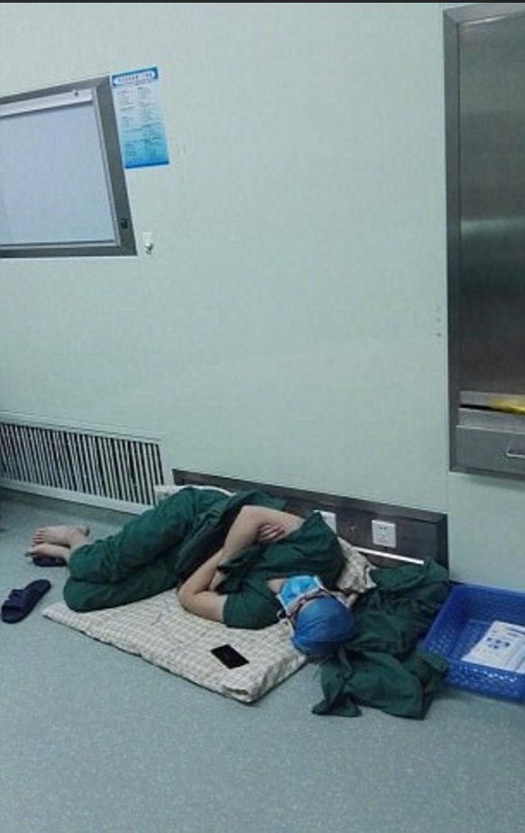 Hero doctor sleeps on floor