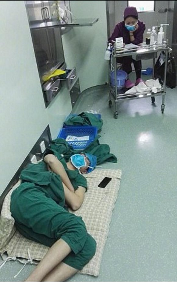 Hero doctor sleeps on floor