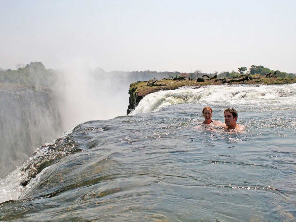 6607610-swim-at-the-edge-of-a-cliff-at-the-devils-pool-a-natural-infinity-pool-in-victoria-falls-which-borders-zambia-and-zimbabwe-1473254537-1000-a3a901cb23-1481527505